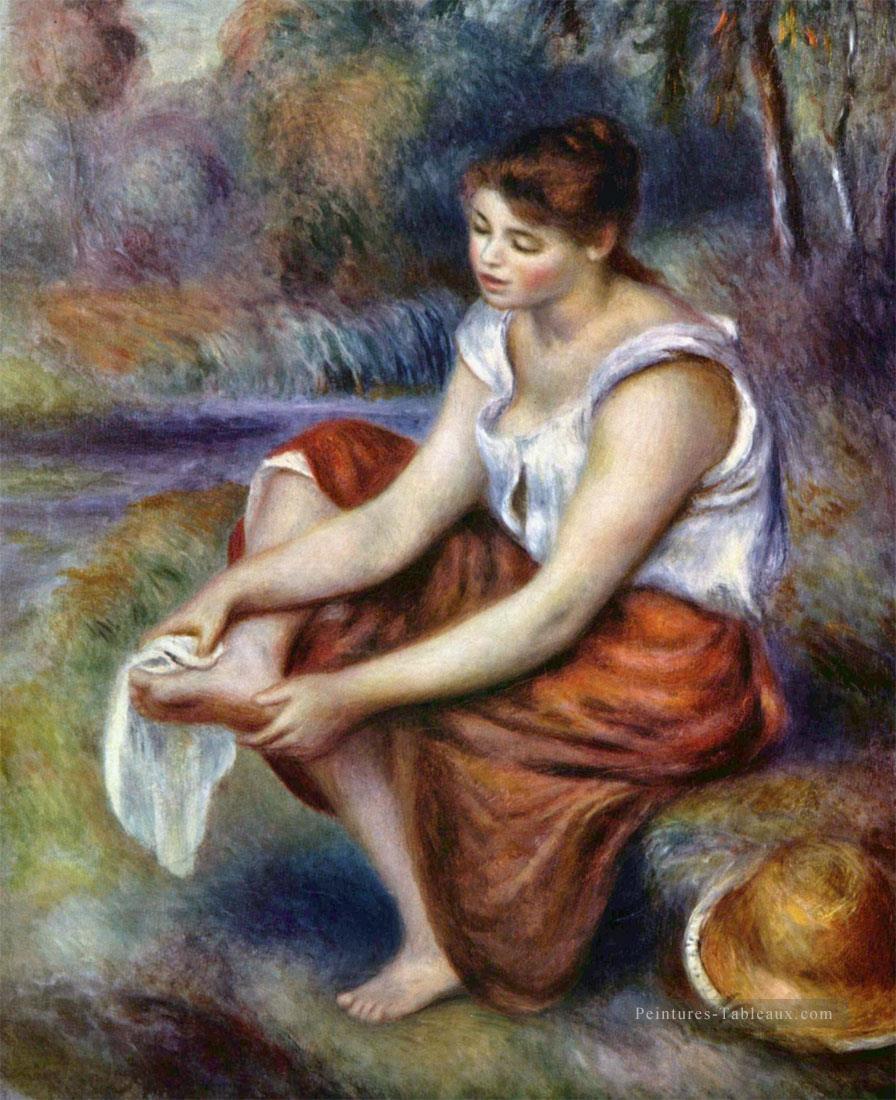 fille s’essuyant les pieds Pierre Auguste Renoir Peintures à l'huile
